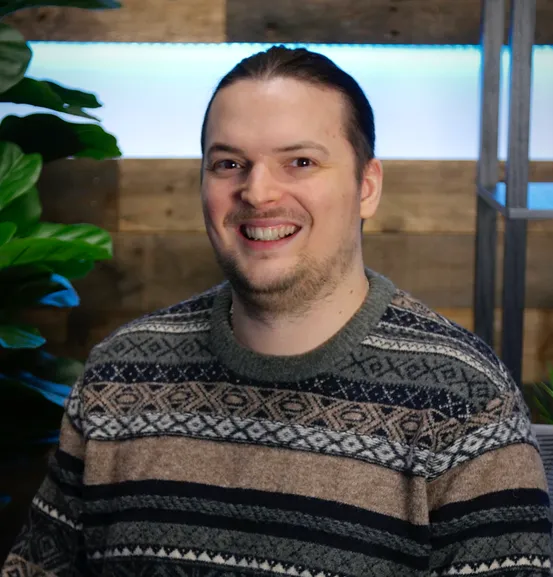 man with striped sweater and brown hair
